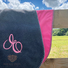 Load image into Gallery viewer, Picnic Snug Main Image Blanket Charcoal with Cerise Backing over fence